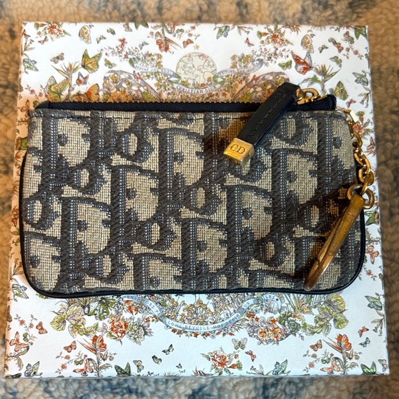 Dior Handbags - Dior Black and Gold Monogram Pouch